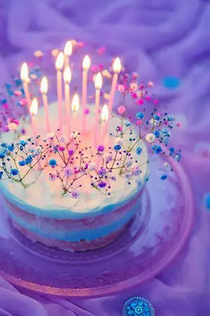 A Purple My Birthday Cake With Flowers