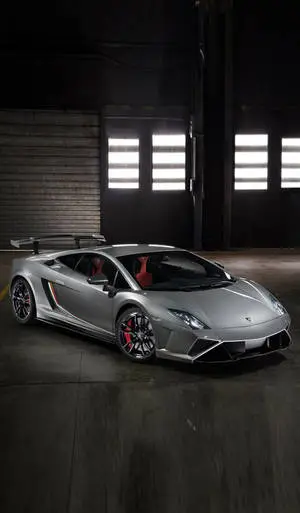 Exclusive Lamborghini iPhone Silver Edition in a Luxurious Garage