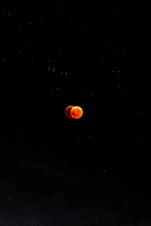Mystical Lunar Connectivity - Two red phones on the Moon