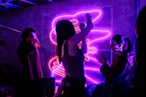 "Let's party in a night of purple-hued fun" 