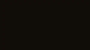 a black background with a white airplane flying in the sky