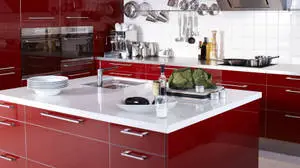  Caption: Vibrant Red and White Modern Kitchen Design 