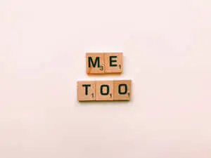 A collection of scrabble tiles spread out as a text background.