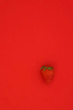 A delicious and juicy red strawberry.