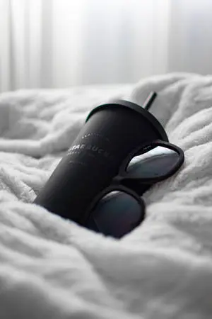 Enjoy your favorite Starbucks beverage from a chic black aesthetic tumbler!