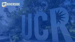  Caption: Blue Hued Image of UCR Campus Entrance Sign 